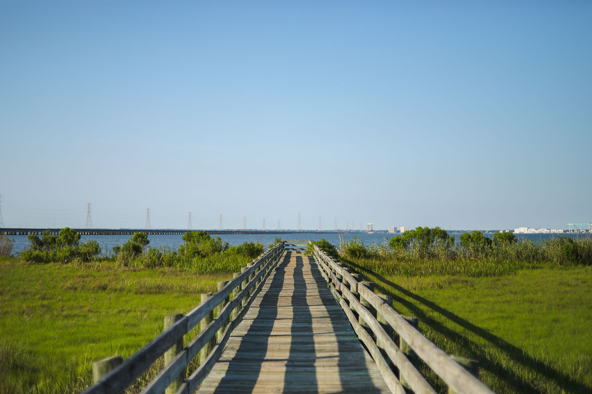 Wooden dock walkway leading out to the James River in the Isle of Wight County, Virginia